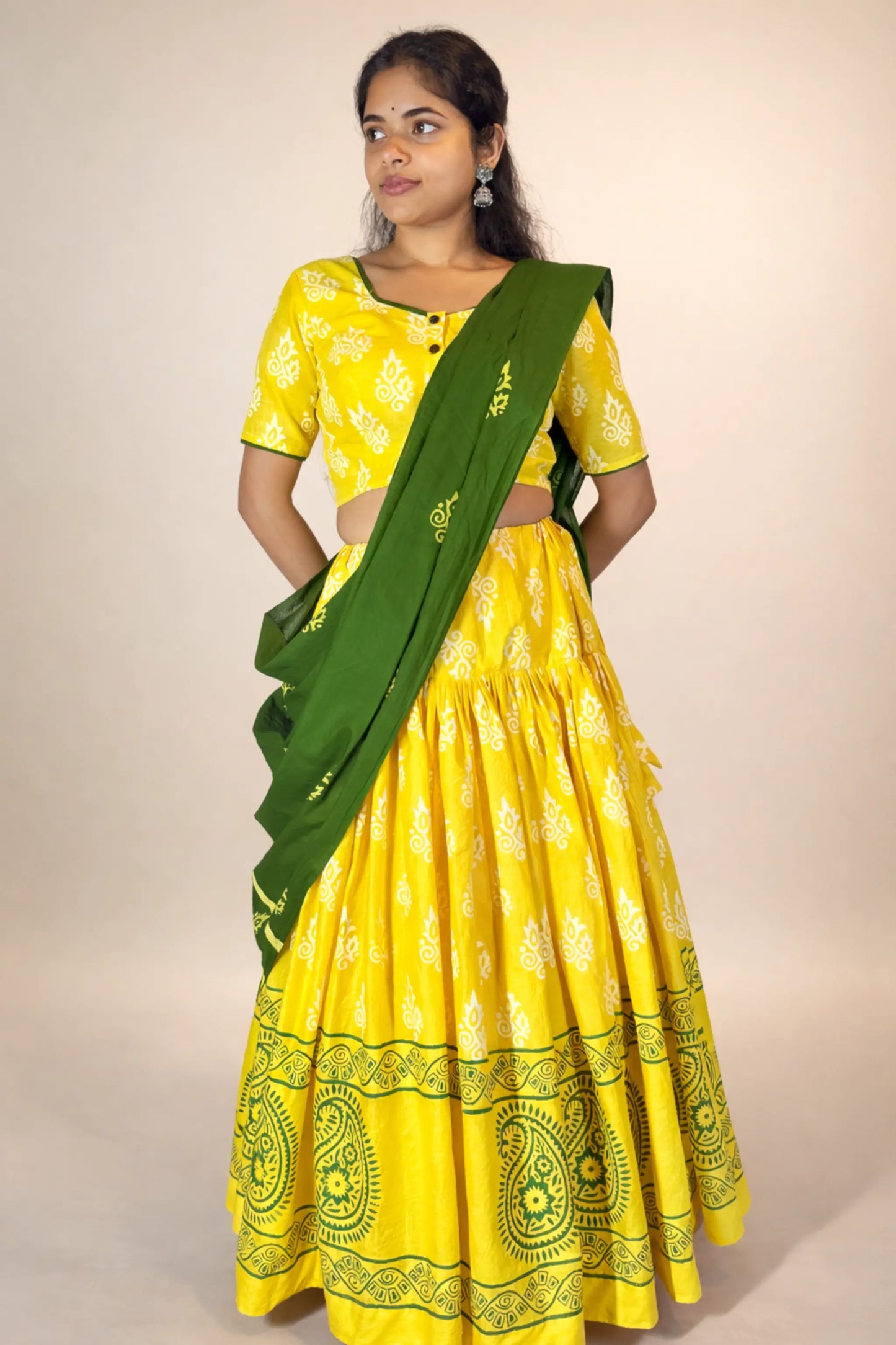 Full front view of Basantika yellow and green hand block print pure cotton gopi skirt set with dupatta