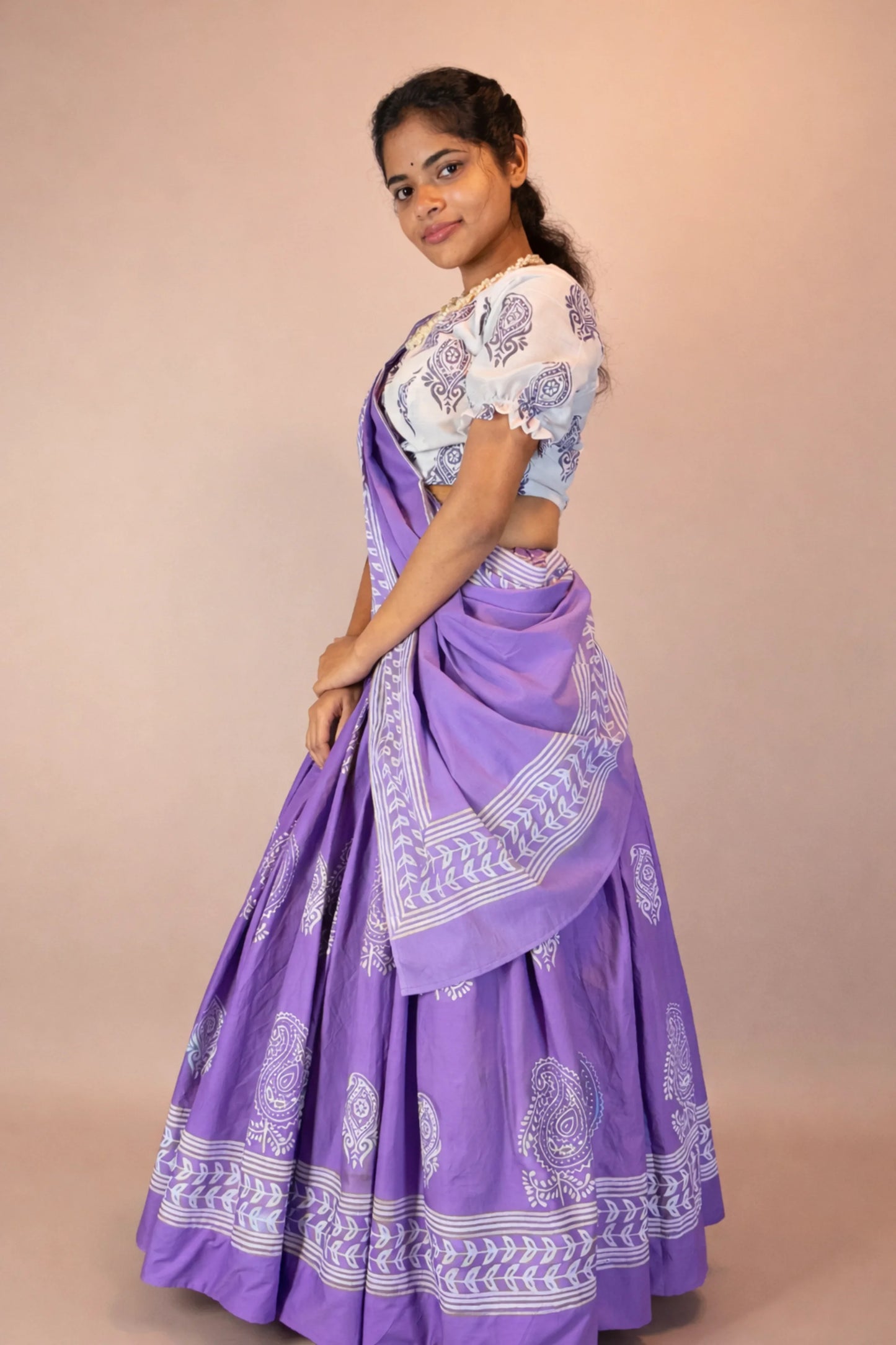 Side view of Anuragini pure cotton hand block print purple Gopi skirt set showing natural drape and flow