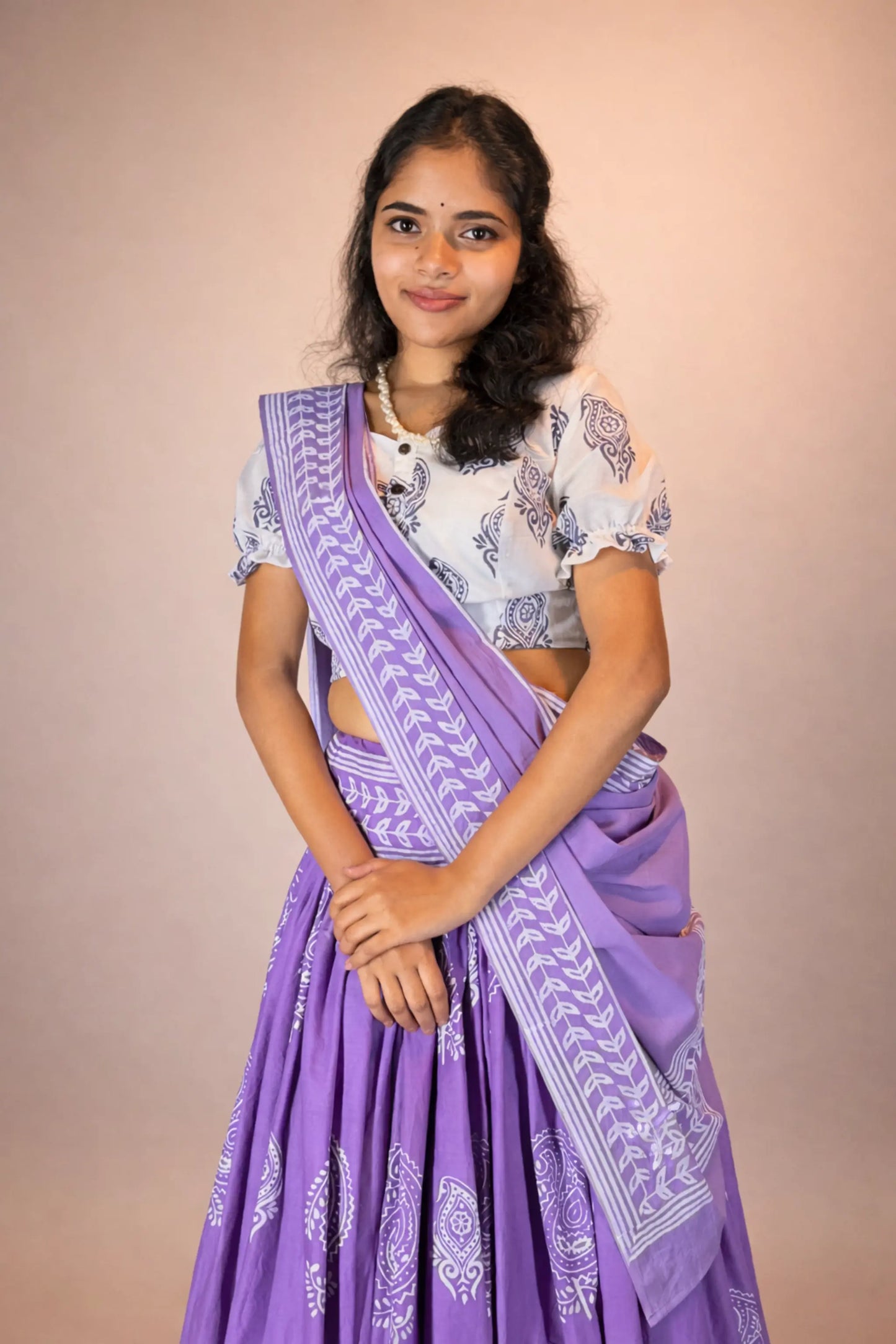 Front portrait of Anuragini pure cotton hand block printed Gopi skirt set styled with traditional accessories