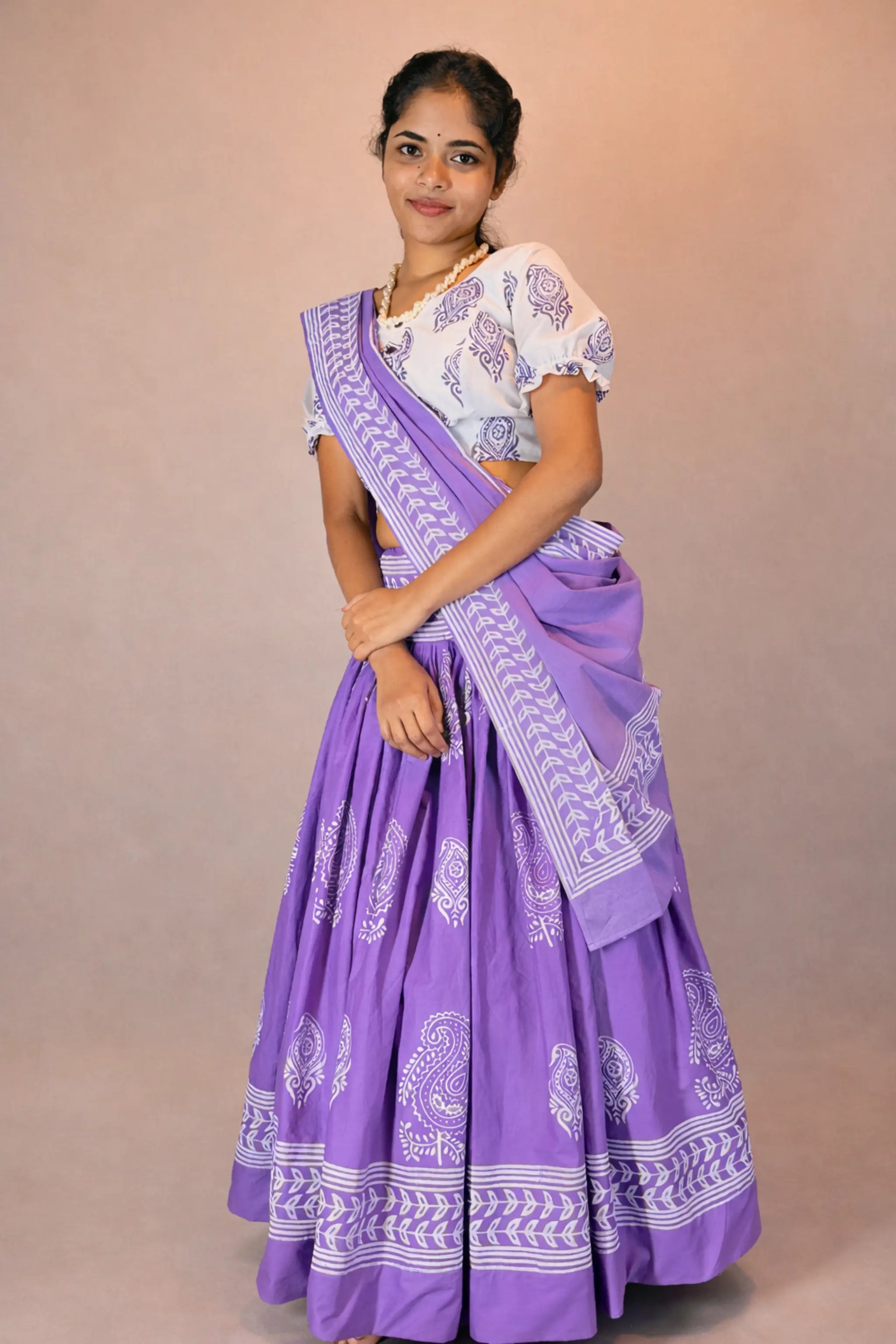 Lifestyle view of Anuragini purple hand block print cotton Gopi skirt set with dupatta styling