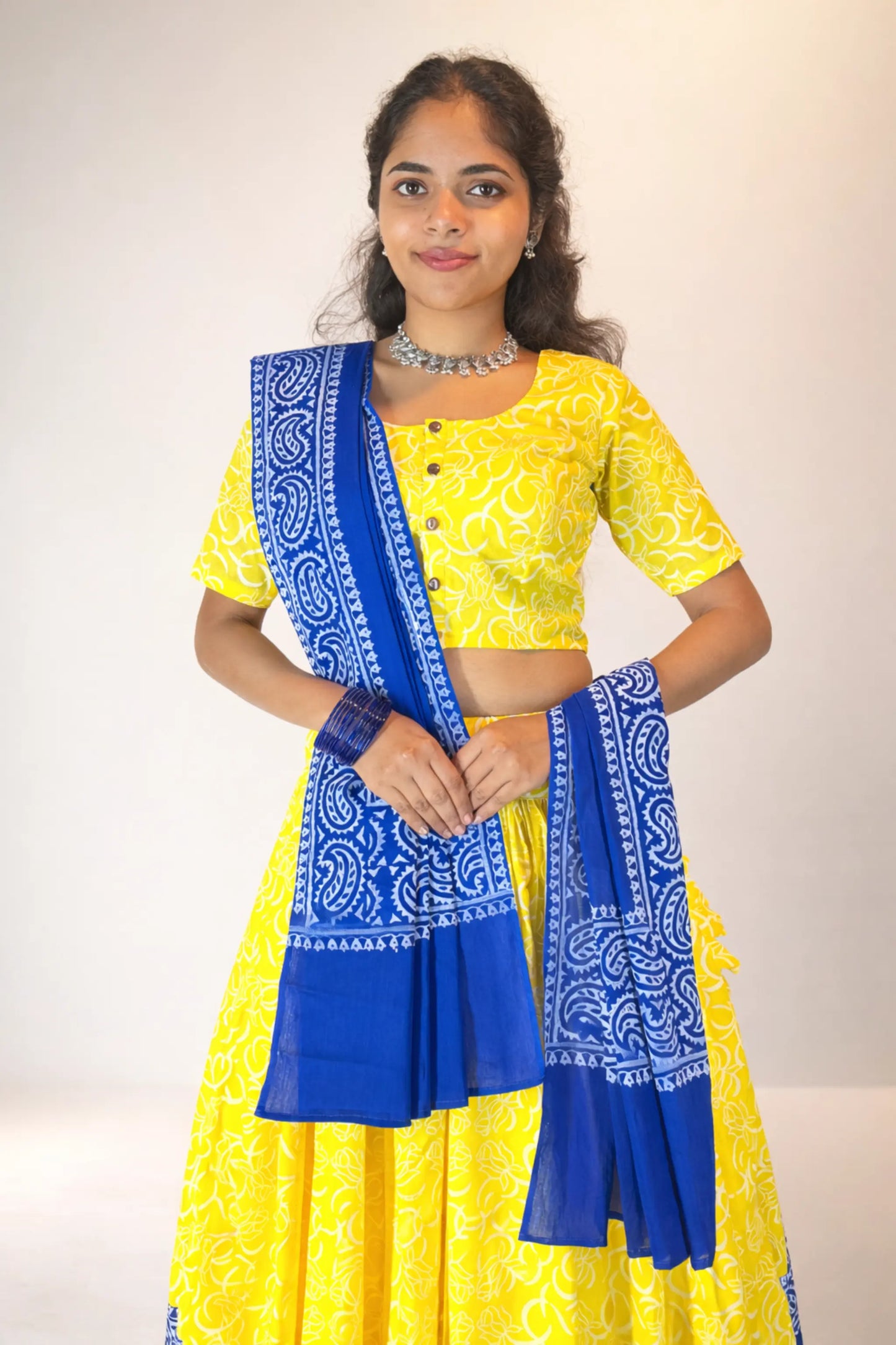 Front upper body view of Neelambari hand block print pure cotton gopi skirt set with blue dupatta