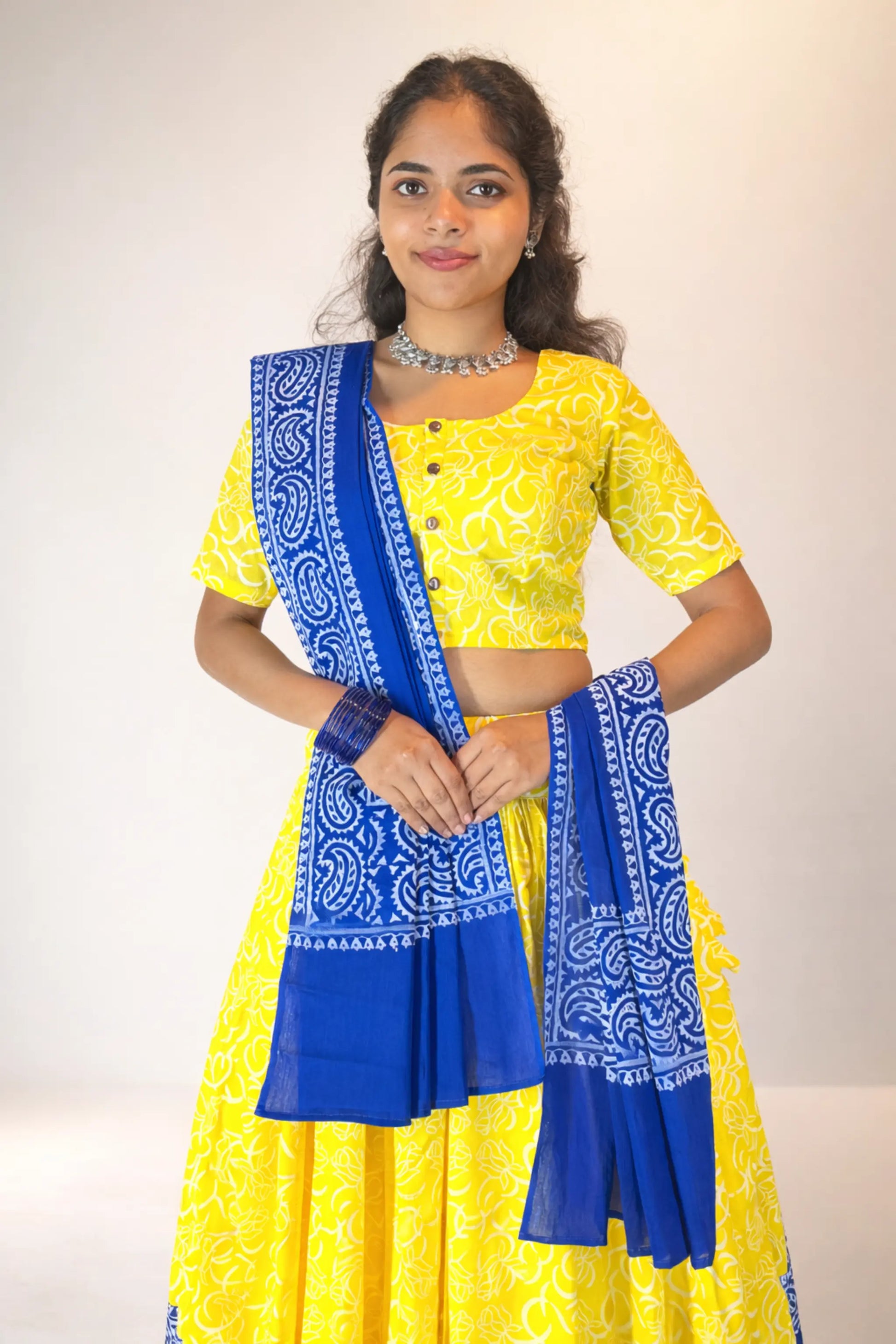 Front upper body view of Neelambari hand block print pure cotton gopi skirt set with blue dupatta