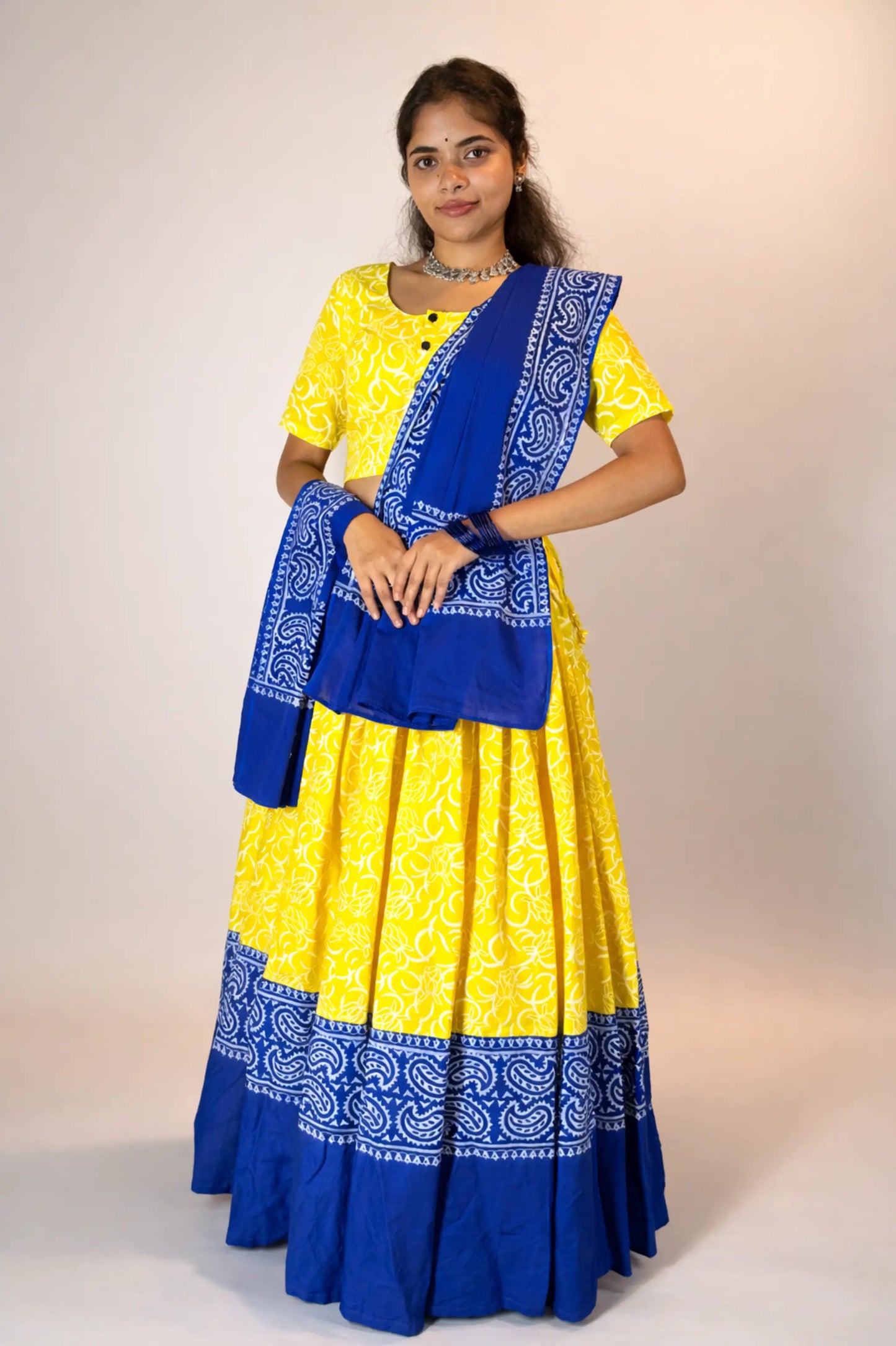 Angled front view of Neelambari hand block print pure cotton gopi skirt set