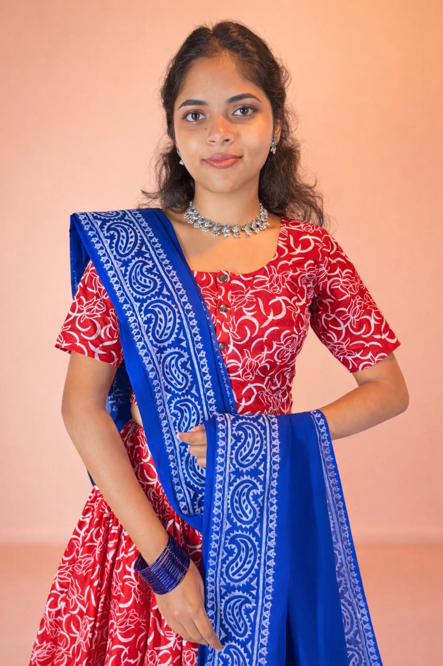 Lifestyle inspired full look of Ranga Moti red and blue hand block print pure cotton gopi dress set
