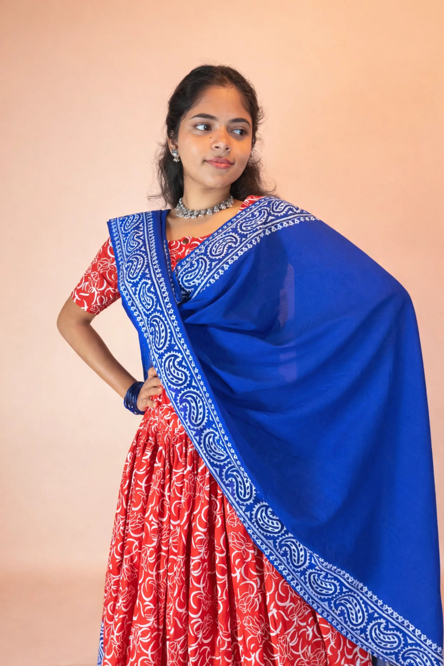 Front pose of Ranga Moti red and blue hand block print pure cotton gopi dress with traditional dupatta styling